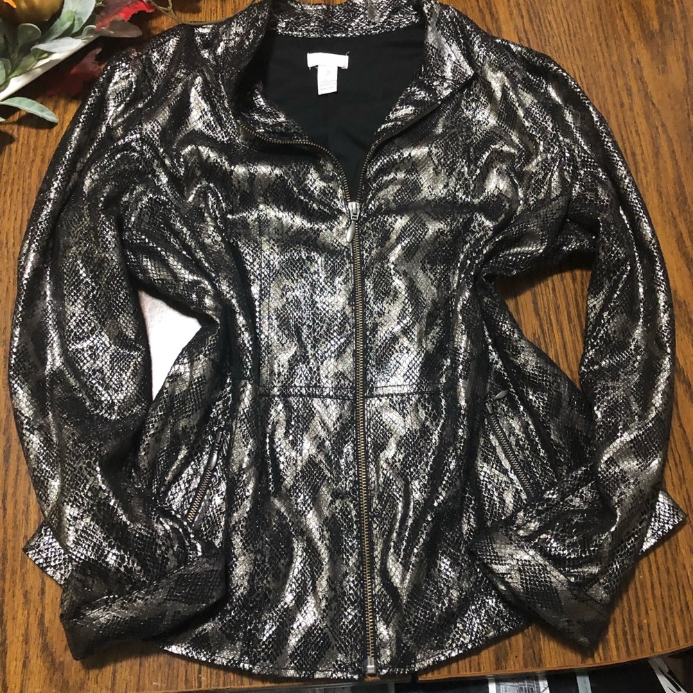 Chico size 2 but fits like an L or XL